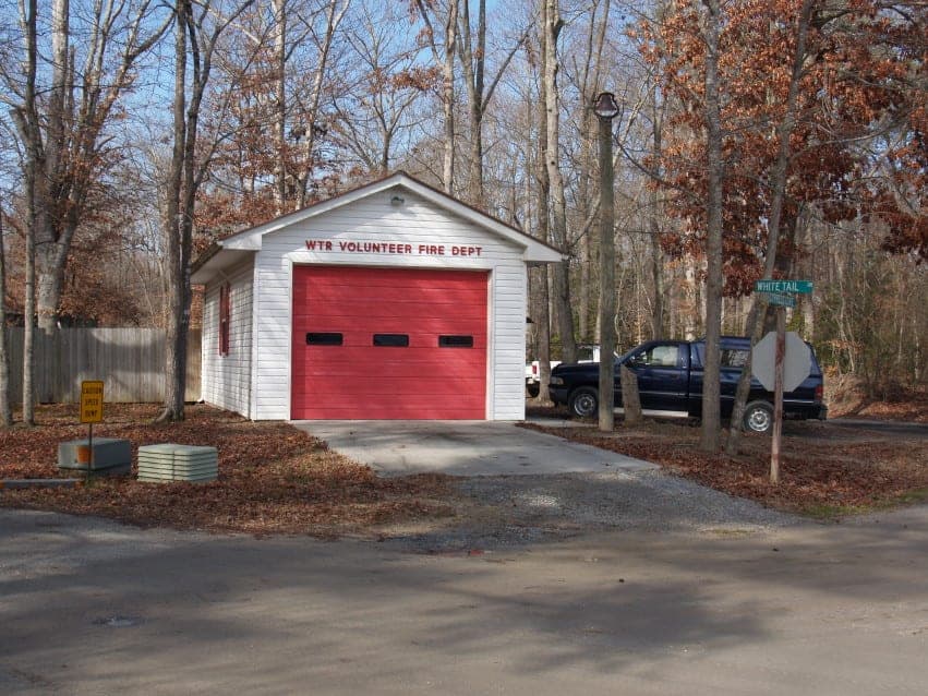 White Tail Resort Volunteer Fire Department building with red garage door